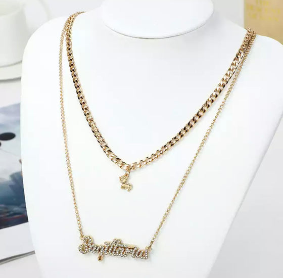 gold diamond sagittarius zodiac necklace set.