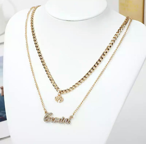 gold diamond gemini zodiac necklace set.