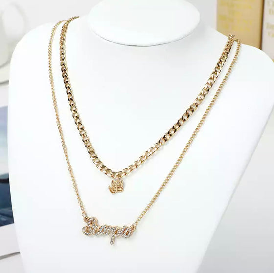 gold diamond scorpio zodiac necklace set.